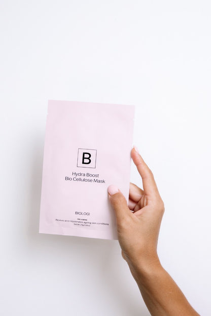 Hand holding Hydra Boost Bio Cellulose Sheet Mask