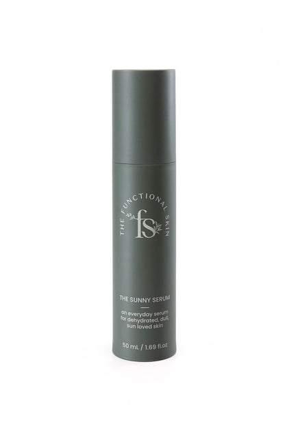 A pump bottle of The Sunny Serum by The Functional Skin, a skincare product designed for hydration and brightening the skin.